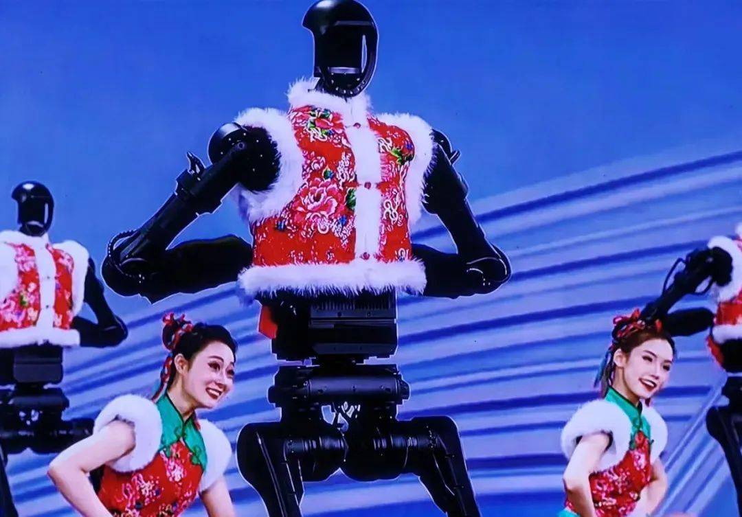 热搜爆了！机器人“扎堆”上春晚，表演翻跟头、“伸头”绝技、蔡明时隔多年又和机器人联动了